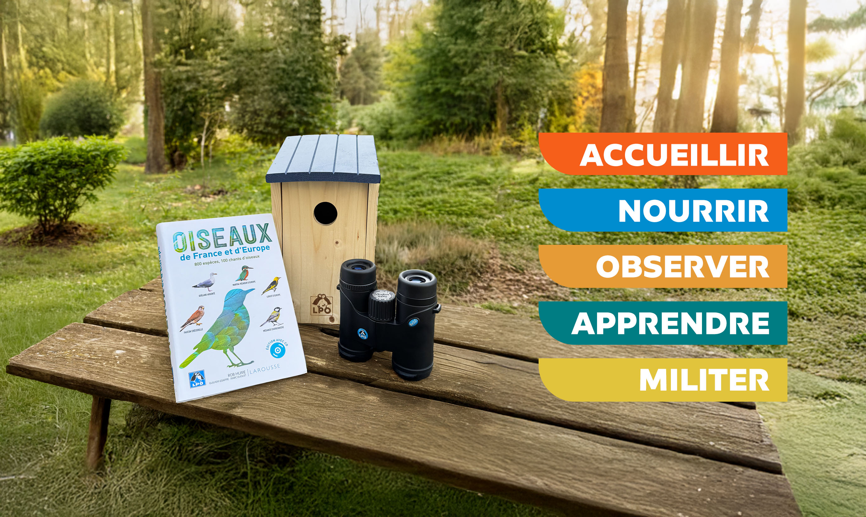 Livre guide oiseaux, nichoir bois et jumelles LPO sur une table en bois